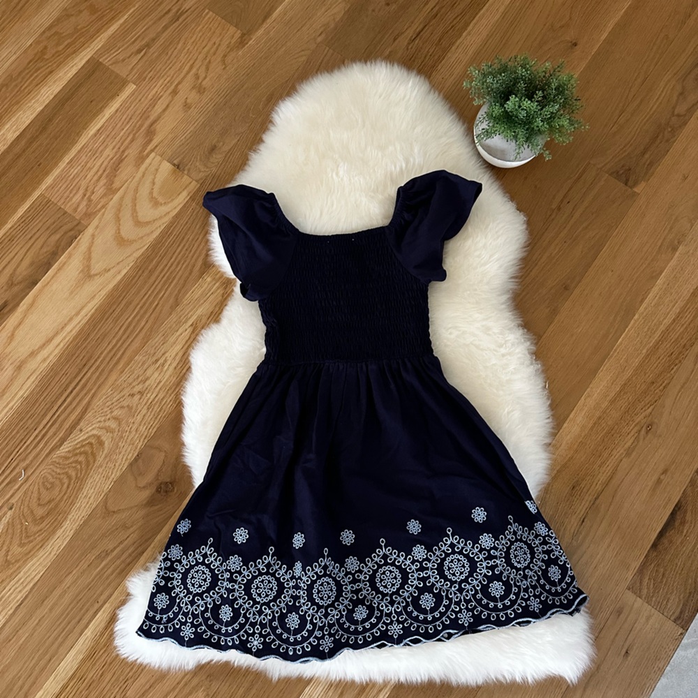 Blue cotton dress with pretty eyelet detail